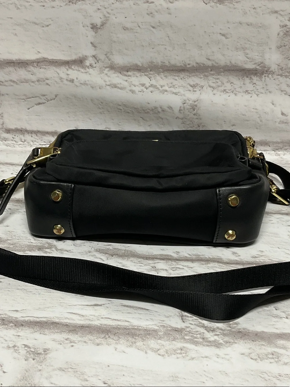 Tumi Black Nylon Crossbody with Gold Hardware Accents